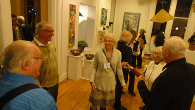 guests and artists at the "FLY" art exhibit